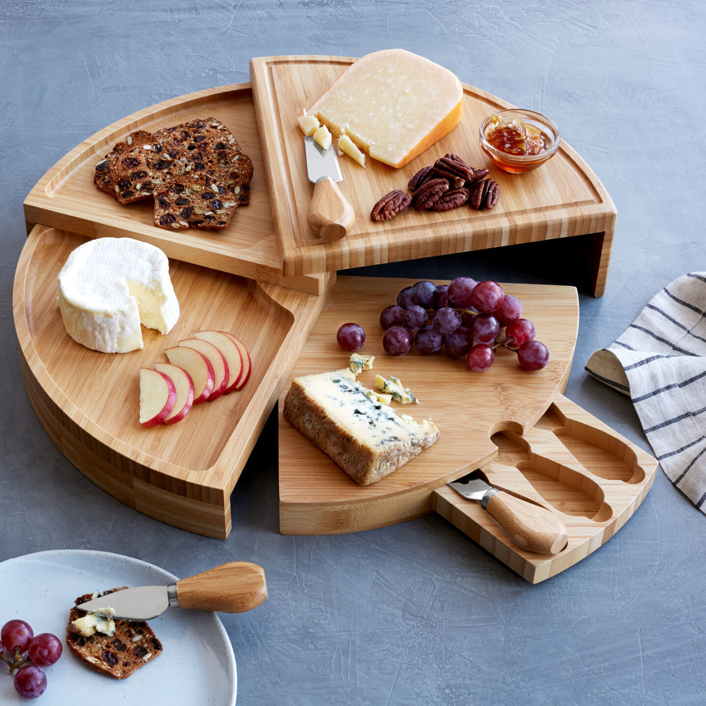 Compact Swivel Cheese Board with Knives by Uncommon Goods